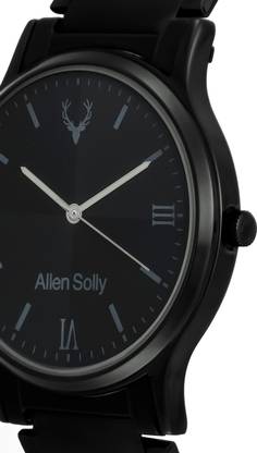 Angled close-up of the dial, hands and crown