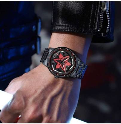 The watch worn on a wrist under a leather jacket cuff